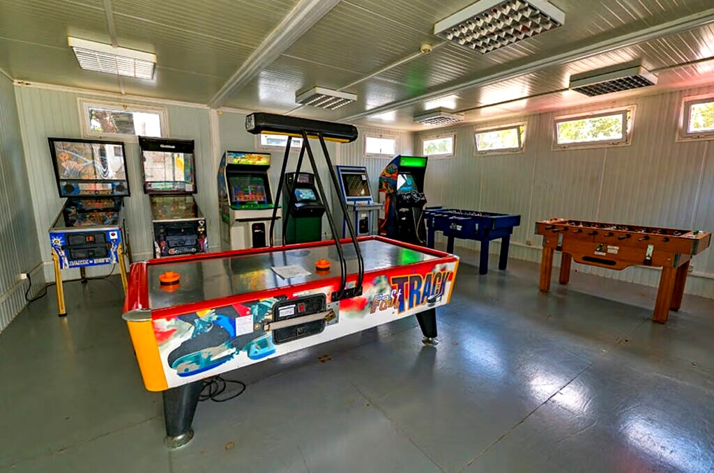 Kids will love playing in the games room at Orbitur Costa da Caparica