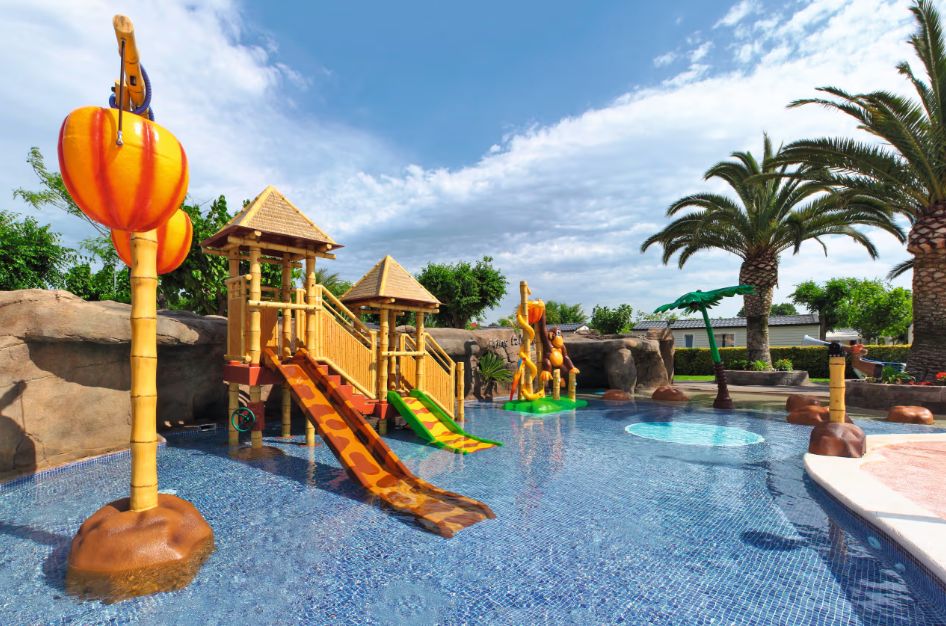 Younger kids will love the splash park at La Masia Campsite